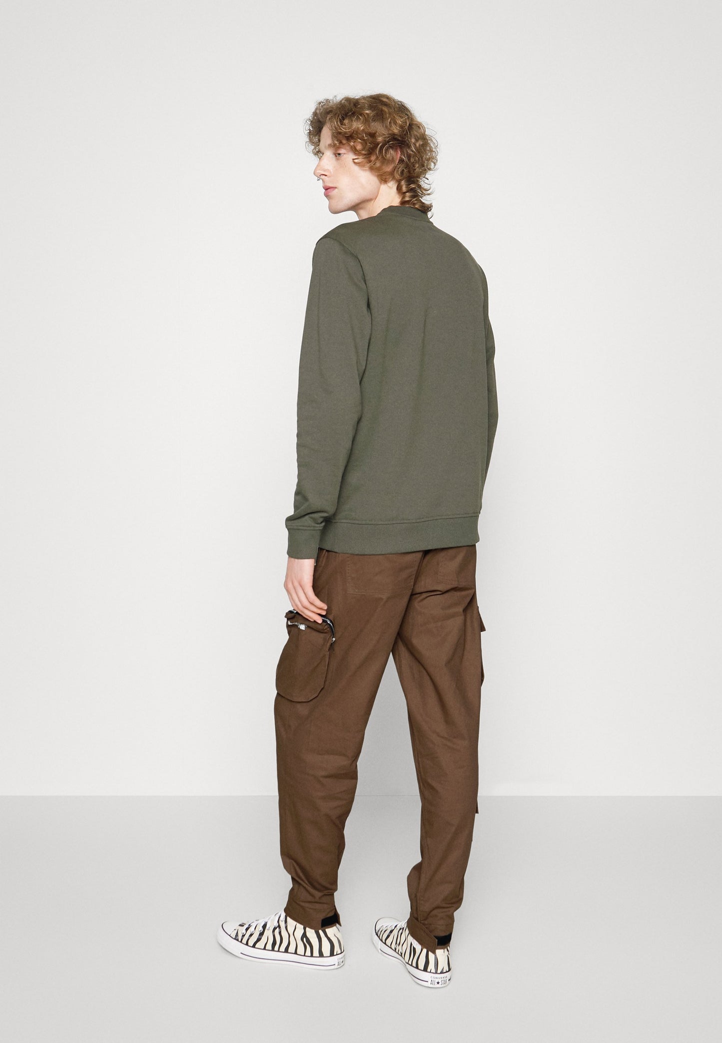 ASYMETRICAL PANTS - Cargo trousers