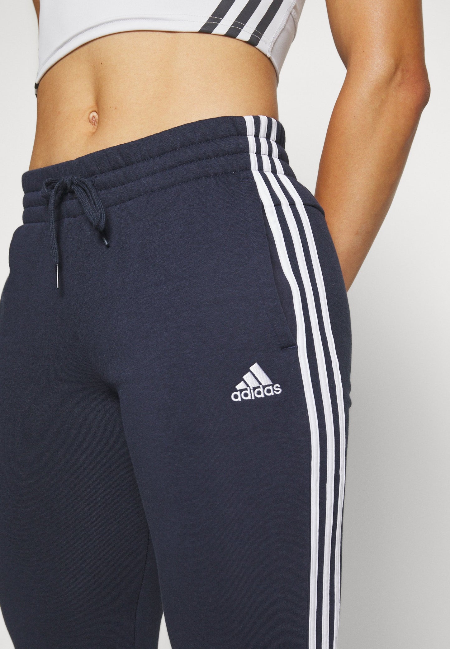 ESSENTIALS FLEECE 3-STRIPES - Tracksuit bottoms